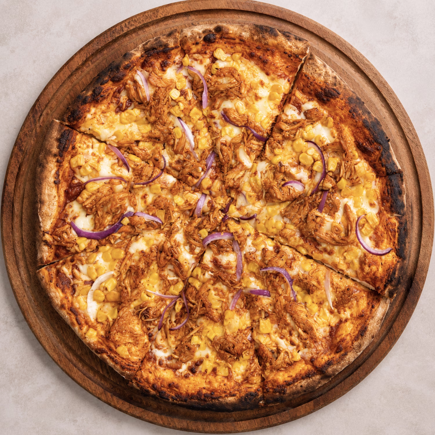 Barbeque Chicken pizza from Da MUNCH House in Secret Beach Belize